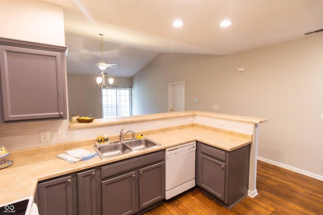 4291 Washington Blvd, Plainfield, IN 46168 - kitchen featuring dishwasher, a sink, lofted ceiling, gray cabinetry, and dark wood-style flooring