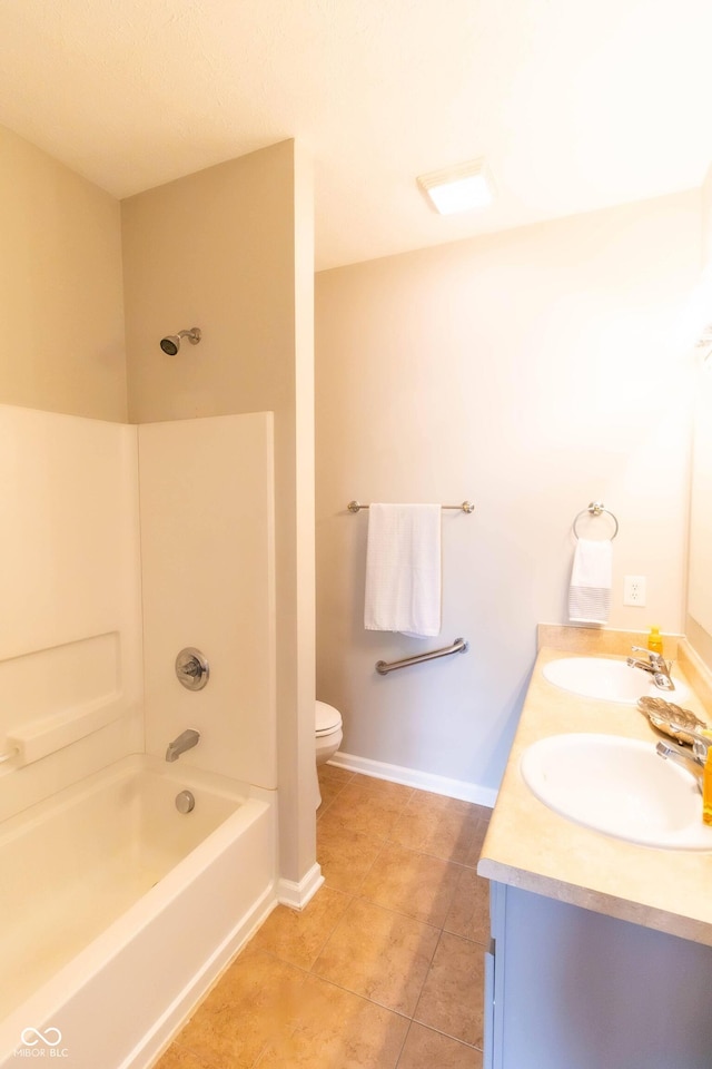 4291 Washington Blvd, Plainfield, IN 46168 - bathroom featuring double vanity, toilet, tile patterned floors, shower / washtub combination, and baseboards