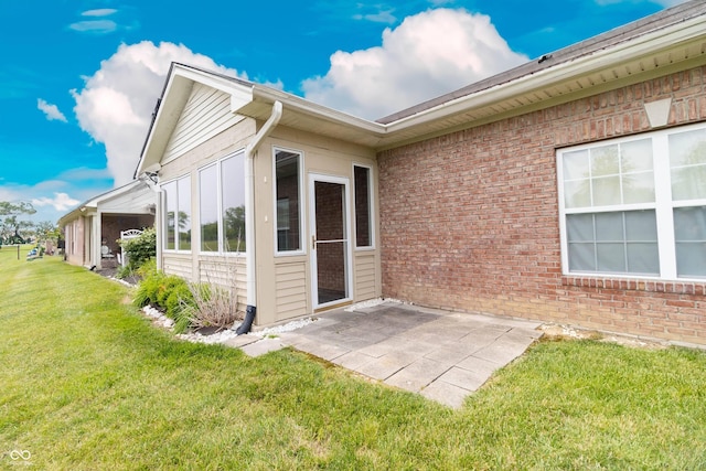 4291 Washington Blvd, Plainfield, IN 46168 - entrance to property with a patio, a yard, and brick siding
