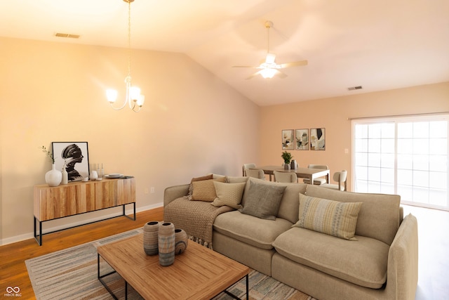 4291 Washington Blvd, Plainfield, IN 46168 - living area with a chandelier, lofted ceiling, wood finished floors, ceiling fan, and baseboards