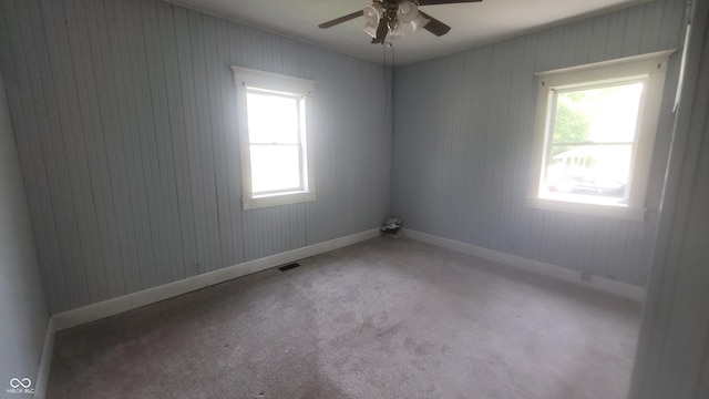 7879 Main St, Coatesville, IN 46121 - carpeted empty room with ceiling fan and baseboards