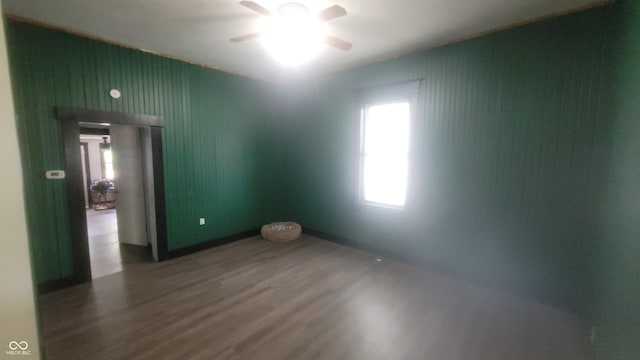 7879 Main St, Coatesville, IN 46121 - spare room with wood finished floors and a ceiling fan