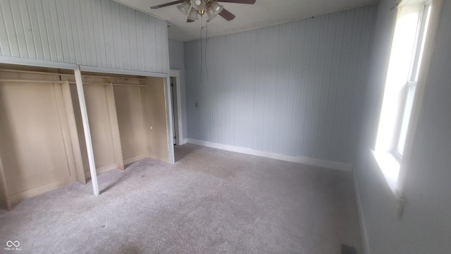 7879 Main St, Coatesville, IN 46121 - unfurnished bedroom with carpet floors, multiple closets, and ceiling fan