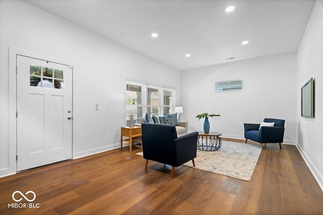 1709 Fletcher Ave, Indianapolis, IN 46203 - living room with wood finished floors, baseboards, and recessed lighting