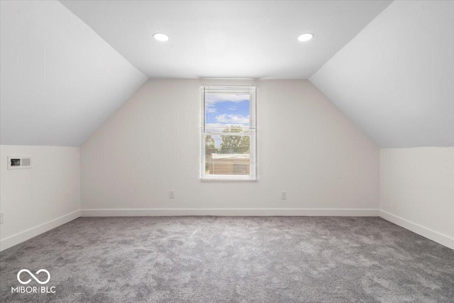 1709 Fletcher Ave, Indianapolis, IN 46203 - additional living space with lofted ceiling, carpet, baseboards, and recessed lighting