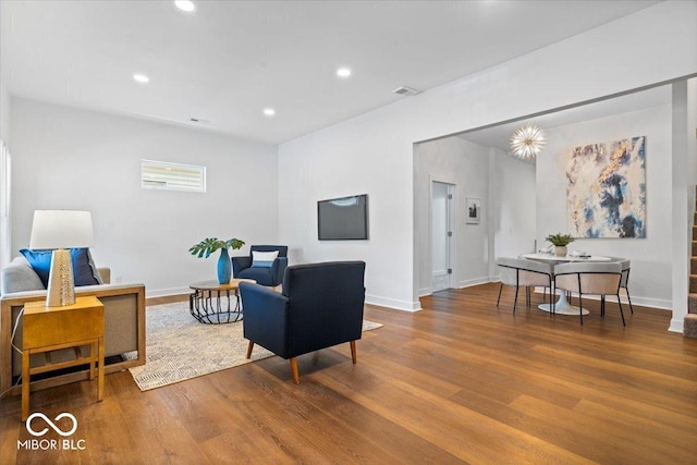 1709 Fletcher Ave, Indianapolis, IN 46203 - living area with wood finished floors, baseboards, and recessed lighting