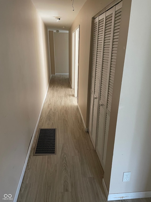 55 W Fall Creek Parkway S Drive, Indianapolis, IN 46208 - hallway featuring wood finished floors and baseboards
