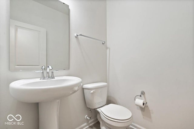 11509 Reagan Dr, Fishers, IN 46038 - half bath with toilet and baseboards