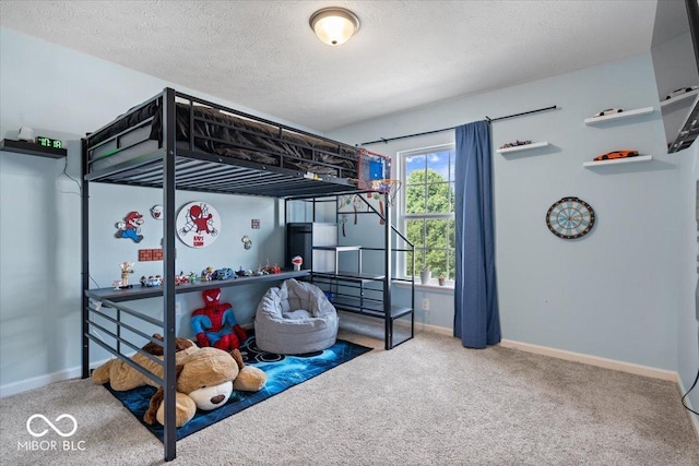 11509 Reagan Dr, Fishers, IN 46038 - bedroom with carpet, baseboards, and a textured ceiling