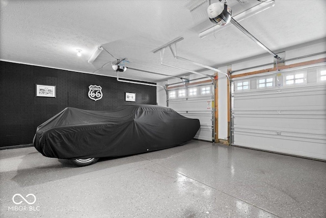 11509 Reagan Dr, Fishers, IN 46038 - garage featuring a garage door opener