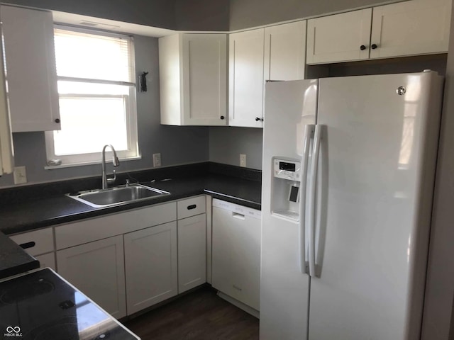 59 W Fall Creek Parkway S Drive, Indianapolis, IN 46208 - kitchen featuring white fridge with ice dispenser, dishwasher, a sink, white cabinets, and dark countertops