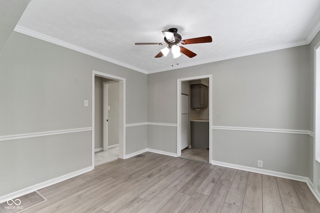 141 S 9th Ave, Beech Grove, IN 46107 - empty room featuring ceiling fan, wood finished floors, baseboards, and ornamental molding