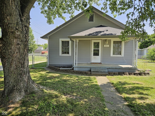 2041 Mckinley Ave, Columbus, IN 47201 - view of front of property with covered porch, a gate, and roof with shingles