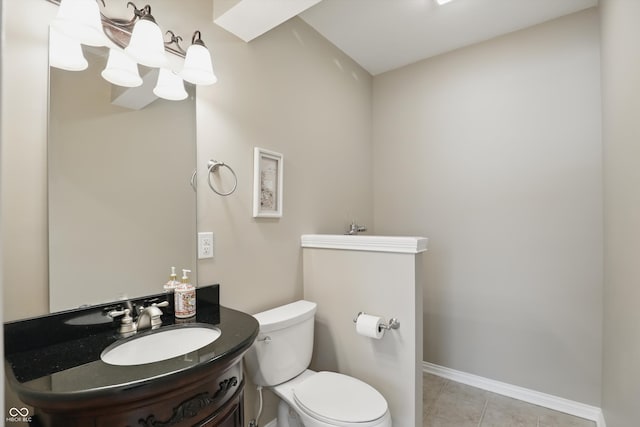 16802 Oak Manor Dr, Westfield, IN 46074 - half bathroom featuring toilet, vanity, tile patterned floors, and baseboards