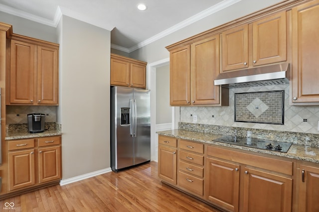 16802 Oak Manor Dr, Westfield, IN 46074 - kitchen with stainless steel fridge, exhaust hood, black electric cooktop, tasteful backsplash, and light stone counters
