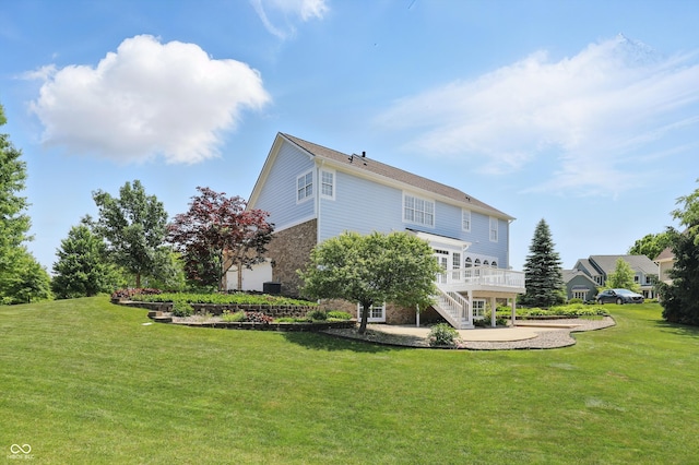 16802 Oak Manor Dr, Westfield, IN 46074 - rear view of house with a lawn, stairway, a deck, and stone siding