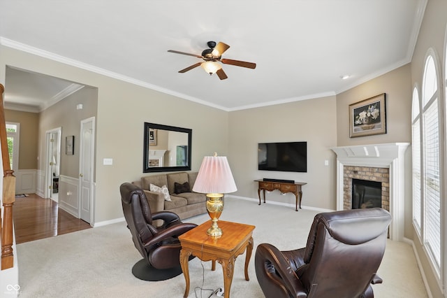 16802 Oak Manor Dr, Westfield, IN 46074 - carpeted living area with a ceiling fan, ornamental molding, and a brick fireplace