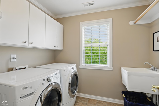 16802 Oak Manor Dr, Westfield, IN 46074 - laundry room with separate washer and dryer, cabinet space, baseboards, and ornamental molding