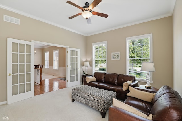 16802 Oak Manor Dr, Westfield, IN 46074 - carpeted living area featuring french doors, ornamental molding, ceiling fan, and plenty of natural light