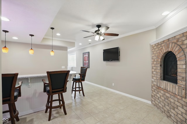 16802 Oak Manor Dr, Westfield, IN 46074 - dining room with ceiling fan, a bar, ornamental molding, recessed lighting, and baseboards