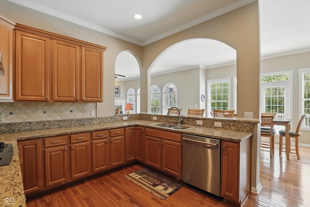 16802 Oak Manor Dr, Westfield, IN 46074 - kitchen featuring dishwasher, a sink, dark wood-style floors, light stone counters, and crown molding