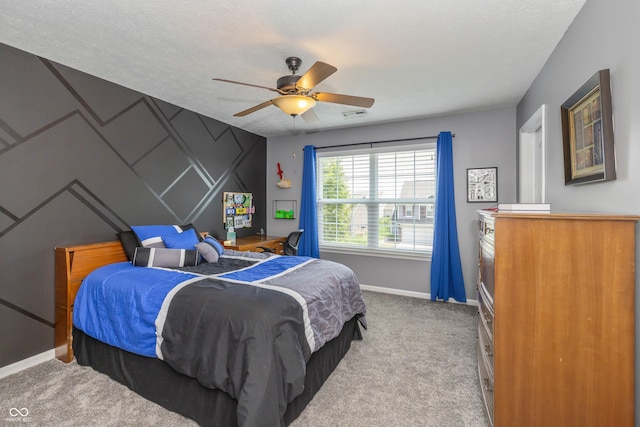 1696 Woodfield Dr, Greenwood, IN 46143 - bedroom featuring baseboards, carpet, and a ceiling fan