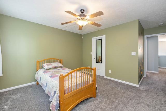 1696 Woodfield Dr, Greenwood, IN 46143 - bedroom featuring carpet flooring, baseboards, and ceiling fan