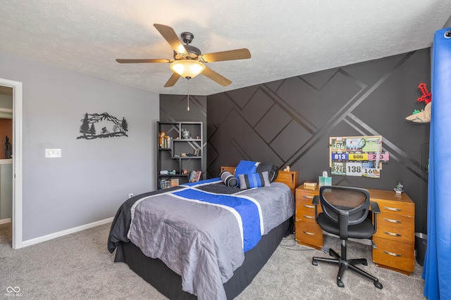 1696 Woodfield Dr, Greenwood, IN 46143 - bedroom with a textured ceiling, carpet floors, baseboards, and ceiling fan