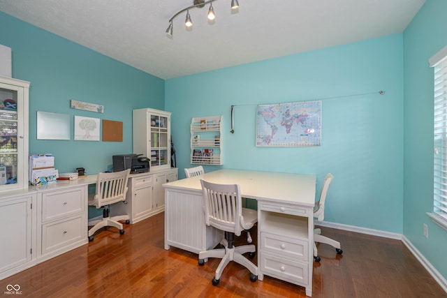 1696 Woodfield Dr, Greenwood, IN 46143 - office featuring dark wood-type flooring and baseboards