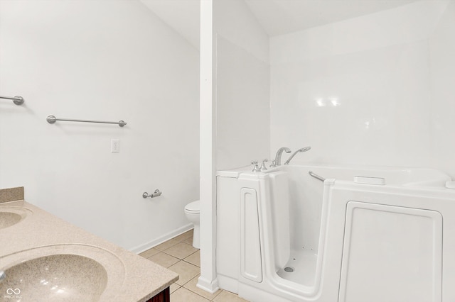 3371 Weathered Rock Cir, Kokomo, IN 46902 - full bathroom with tile patterned floors, a bath, double vanity, and toilet