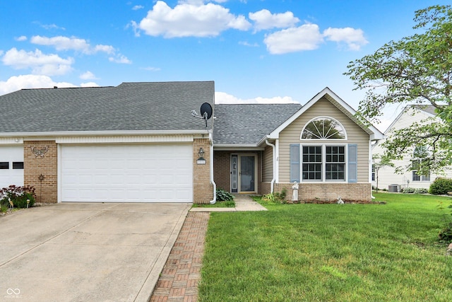 3371 Weathered Rock Cir, Kokomo, IN 46902 - view of front facade featuring brick siding, concrete driveway, a front yard, and a garage