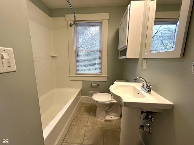 38 N Irvington Ave, Indianapolis, IN 46219 - bathroom with tile patterned flooring, plenty of natural light, and shower / washtub combination