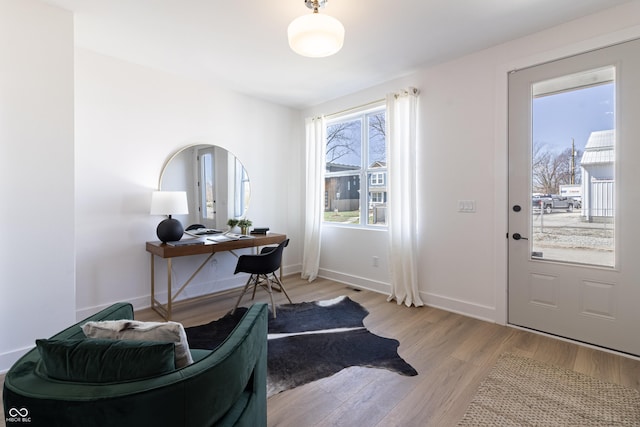 2051 Columbia Ave, Indianapolis, IN 46202 - foyer entrance featuring light wood-style flooring and baseboards