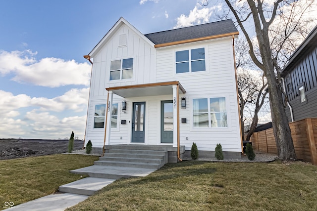 2053 Columbia Ave, Indianapolis, IN 46202 - view of front facade with board and batten siding and a shingled roof