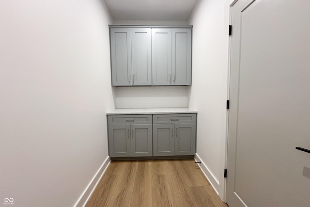2053 Columbia Ave, Indianapolis, IN 46202 - corridor with light wood-style flooring and baseboards