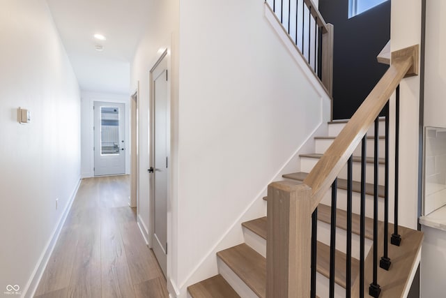 2053 Columbia Ave, Indianapolis, IN 46202 - staircase with wood finished floors and baseboards