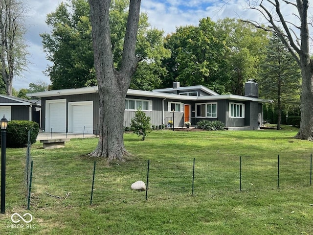 6805 Twin Brooks Dr, Indianapolis, IN 46227 - view of front of home featuring a chimney and a garage