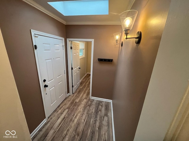 6805 Twin Brooks Dr, Indianapolis, IN 46227 - hallway featuring dark wood-type flooring, a skylight, and ornamental molding