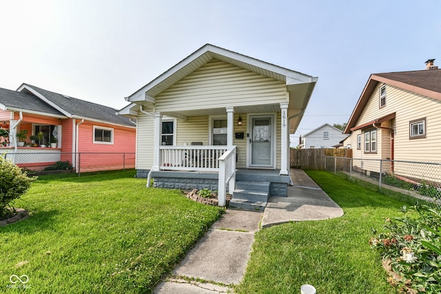 1619 E Bradbury Ave, Indianapolis, IN 46203 - shotgun-style home featuring a porch