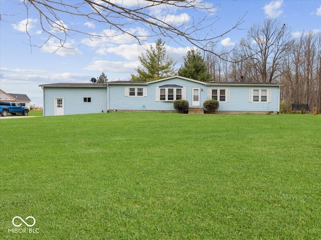 1447 NE Kutenai Trl, Greensburg, IN 47240 - back of property featuring a yard