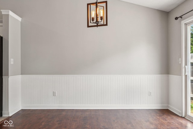 17357 Austrian Pine Way, Westfield, IN 46074 - spare room featuring wood finished floors, a chandelier, and wainscoting