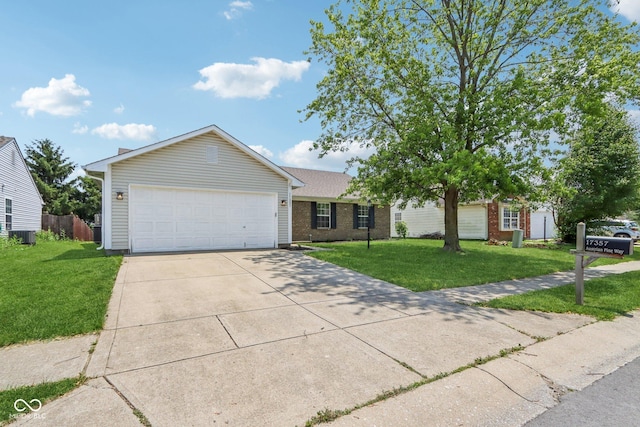 17357 Austrian Pine Way, Westfield, IN 46074 - single story home with driveway, a front yard, a garage, and brick siding