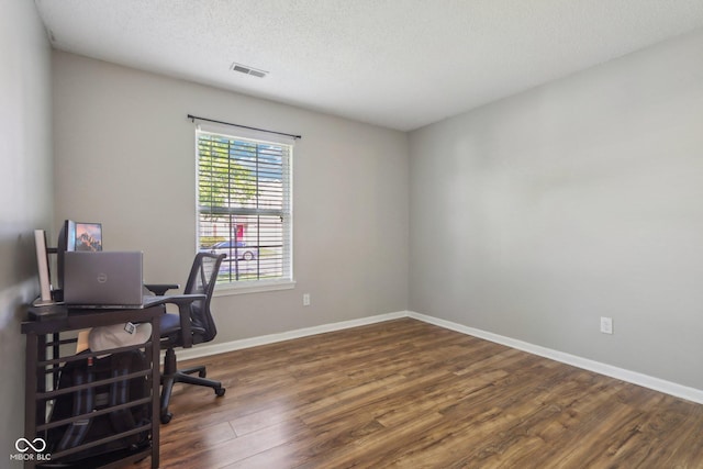 17357 Austrian Pine Way, Westfield, IN 46074 - office area featuring wood finished floors, a textured ceiling, and baseboards
