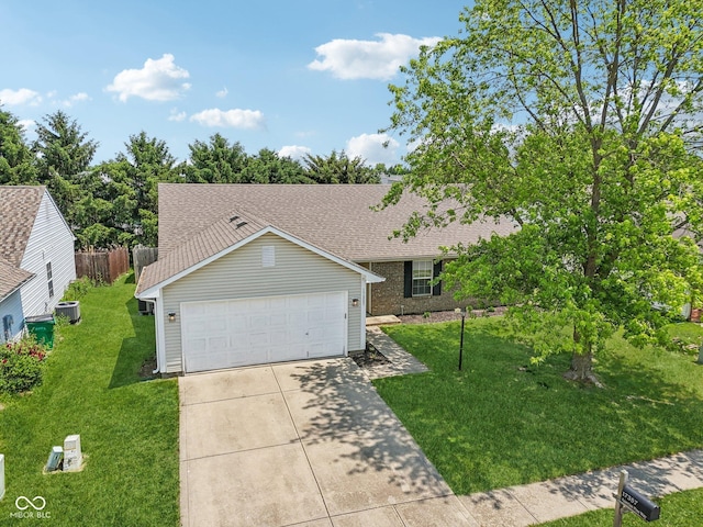 17357 Austrian Pine Way, Westfield, IN 46074 - view of front of property with central air condition unit, concrete driveway, an attached garage, and a shingled roof