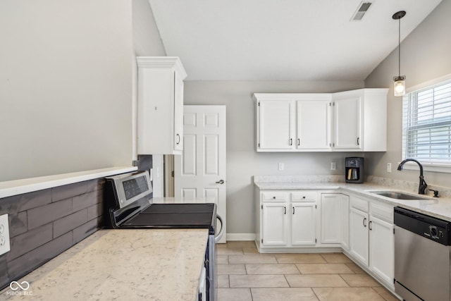 17357 Austrian Pine Way, Westfield, IN 46074 - kitchen featuring stainless steel appliances, a sink, white cabinetry, hanging light fixtures, and light stone countertops