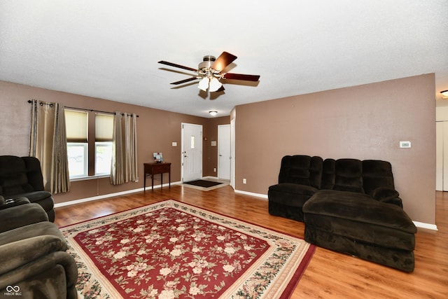 3429 Pavetto Ln, Indianapolis, IN 46203 - living area with wood finished floors and a ceiling fan
