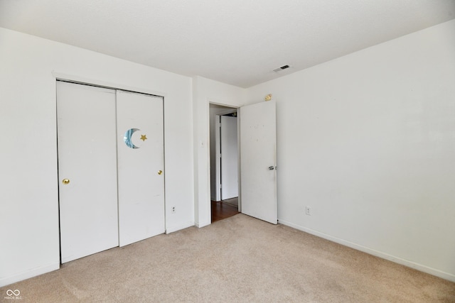 3429 Pavetto Ln, Indianapolis, IN 46203 - unfurnished bedroom featuring light colored carpet and a closet