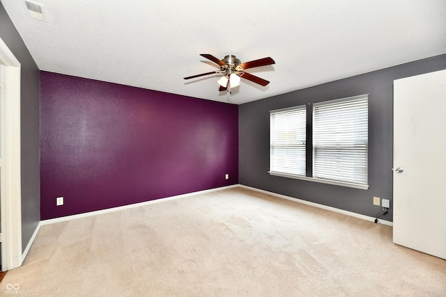 3429 Pavetto Ln, Indianapolis, IN 46203 - carpeted spare room featuring a ceiling fan and baseboards