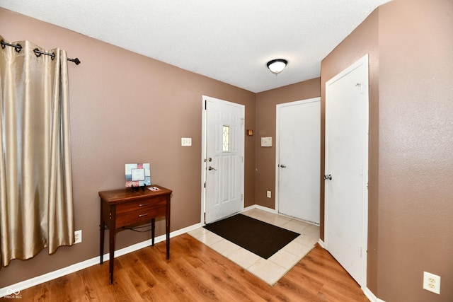 3429 Pavetto Ln, Indianapolis, IN 46203 - entrance foyer with light wood-type flooring and baseboards