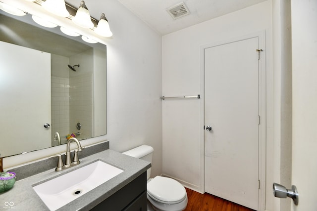 3429 Pavetto Ln, Indianapolis, IN 46203 - full bath with vanity, a shower, and wood finished floors